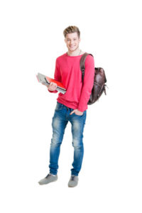 Teenage student holding bag and books